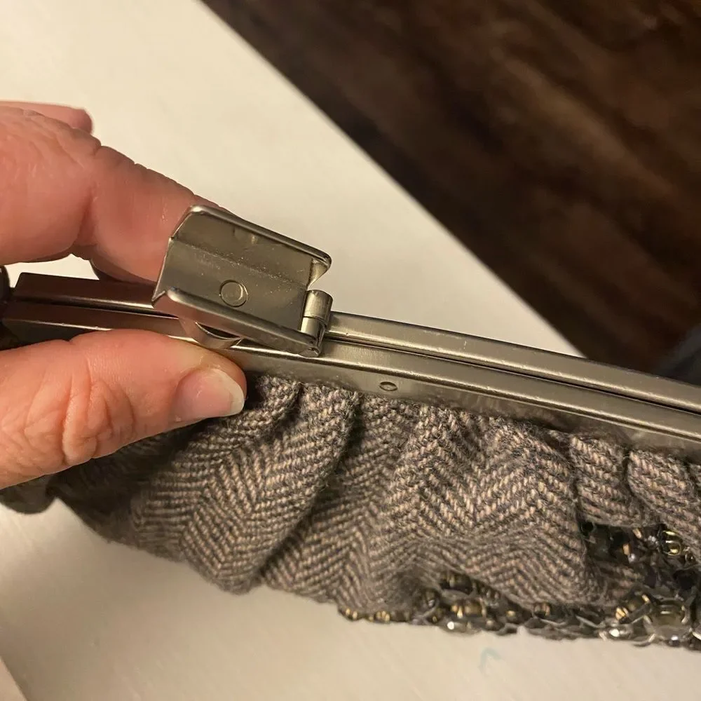 Kenneth Cole Woman’s Wristlet, tweed and beaded!